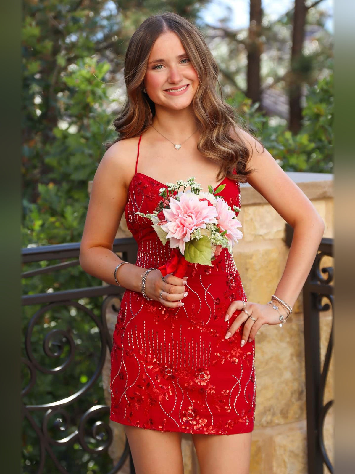 Pink mini homecoming dress, alternate view showing the skirt and hem