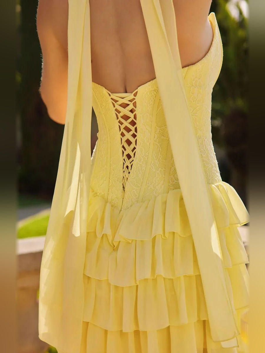 Yellow mini homecoming dress, alternate view showing the skirt and hem