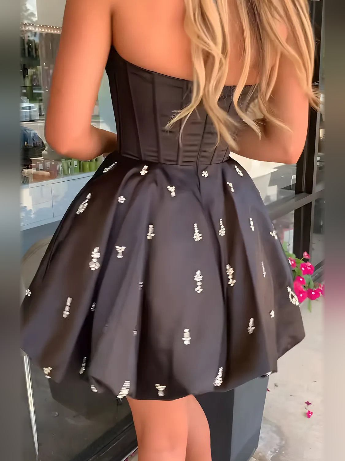 White mini homecoming dress, alternate view showing the skirt and hem