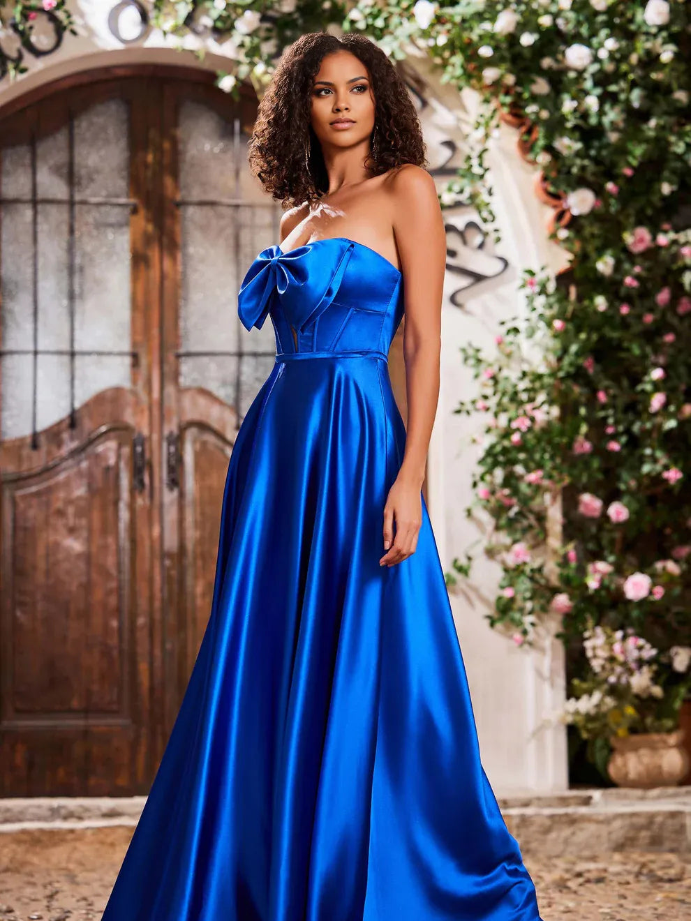 Royal Blue maxi prom dress, front view showing the a-line silhouette showing the garment from a different position