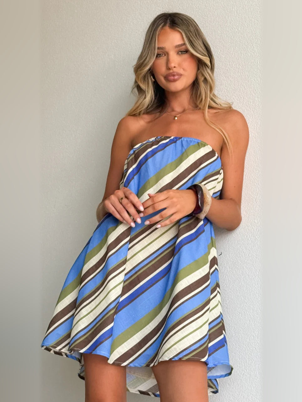 Blue mini homecoming dress, alternate view showing the skirt and hem