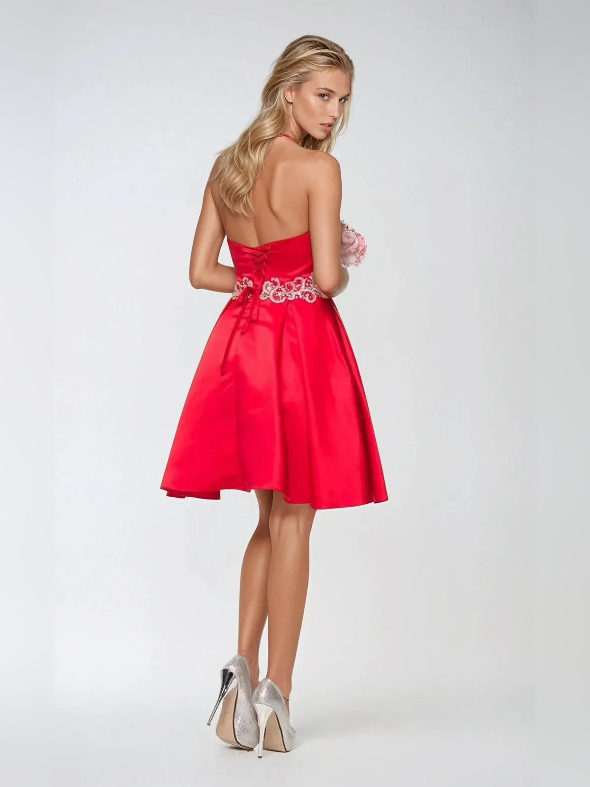 Turquoise short homecoming dress, alternate view showing the skirt and hem
