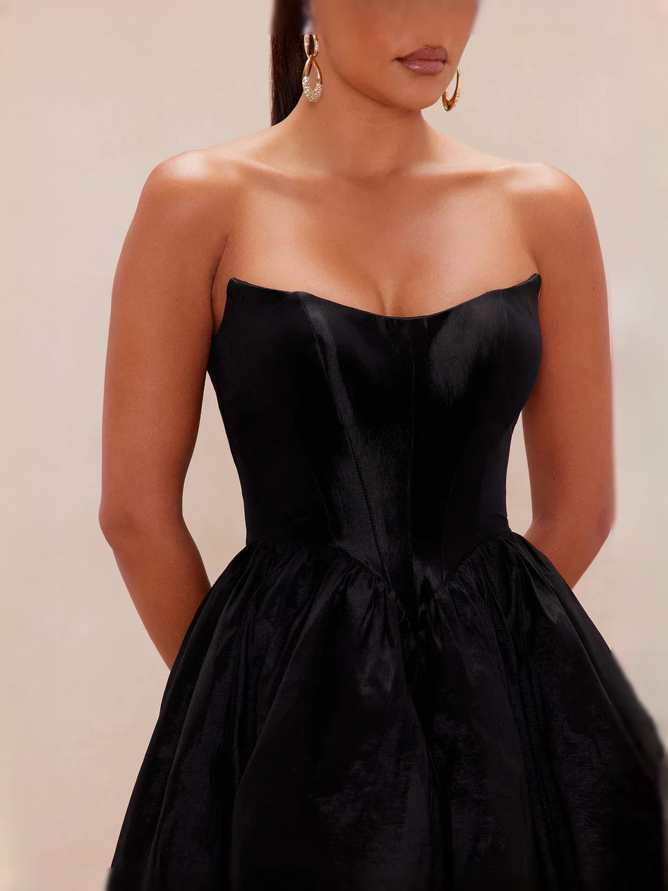 Black high-low prom dress, alternate view showing the skirt and hem