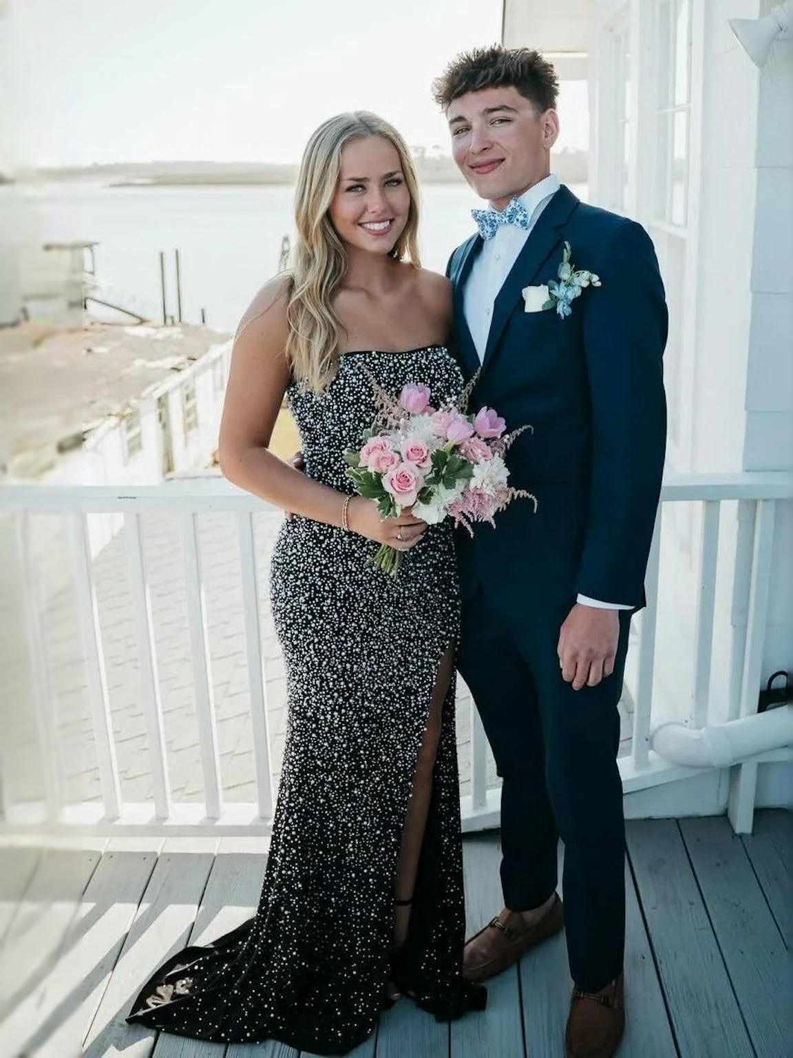 Black floor-length prom dress, alternate view showing the skirt and hem