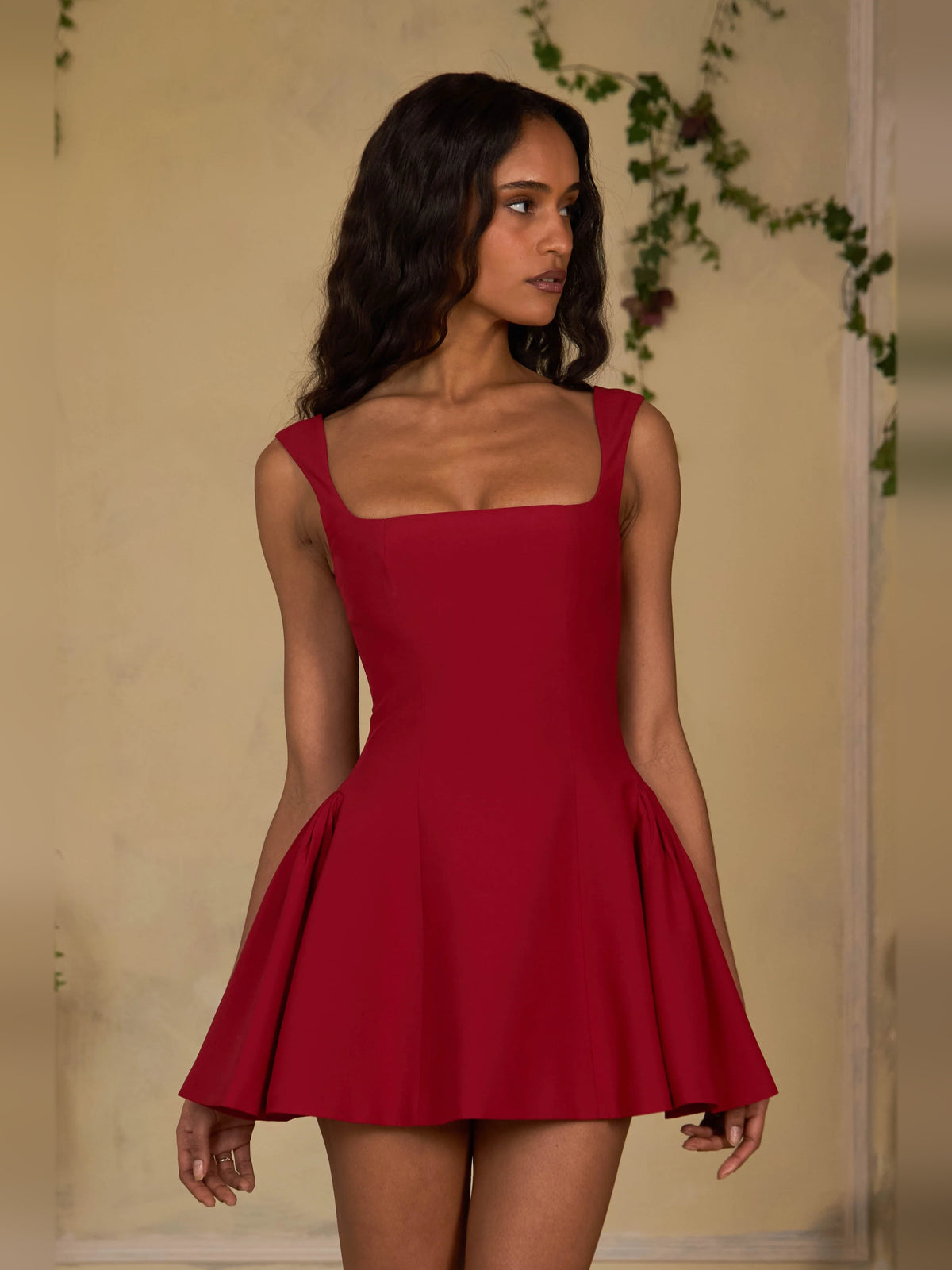 Red mini homecoming dress, alternate view showing the skirt and hem