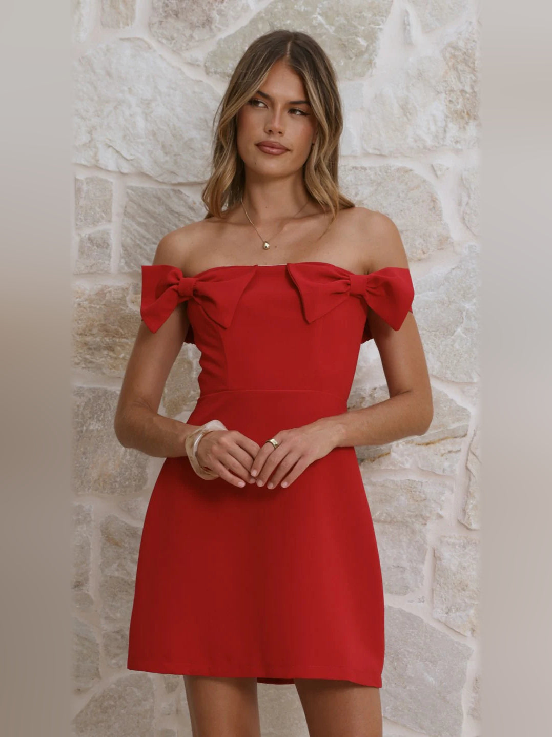 Red mini homecoming dress, alternate view showing the skirt and hem