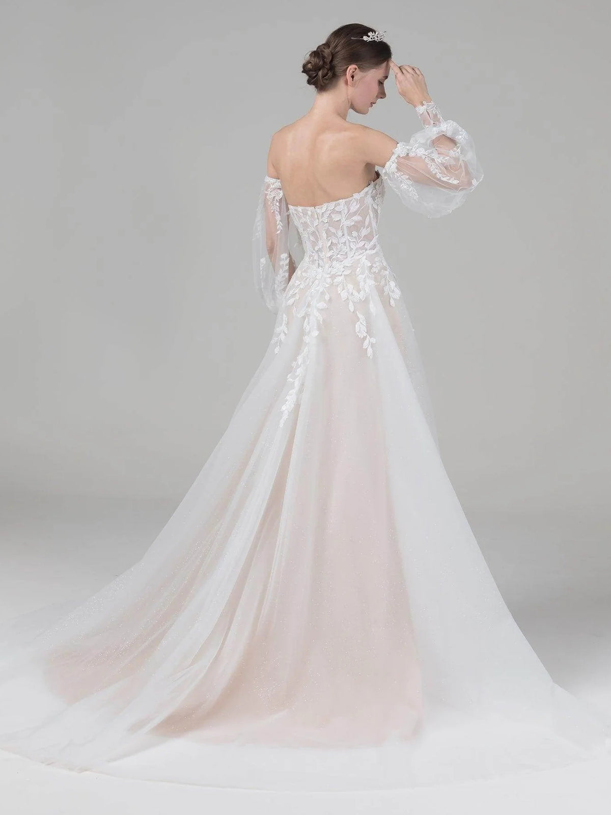 Ivory floor-length wedding dress, alternate view showing the skirt and hem