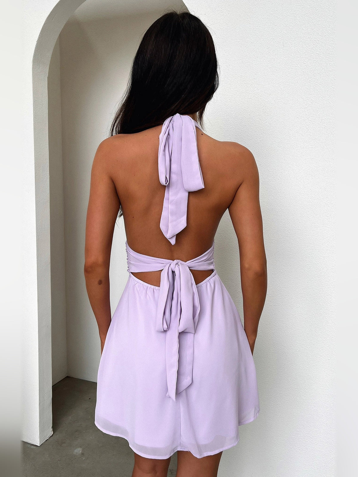 Ivory white mini homecoming dress, alternate view showing the skirt and hem