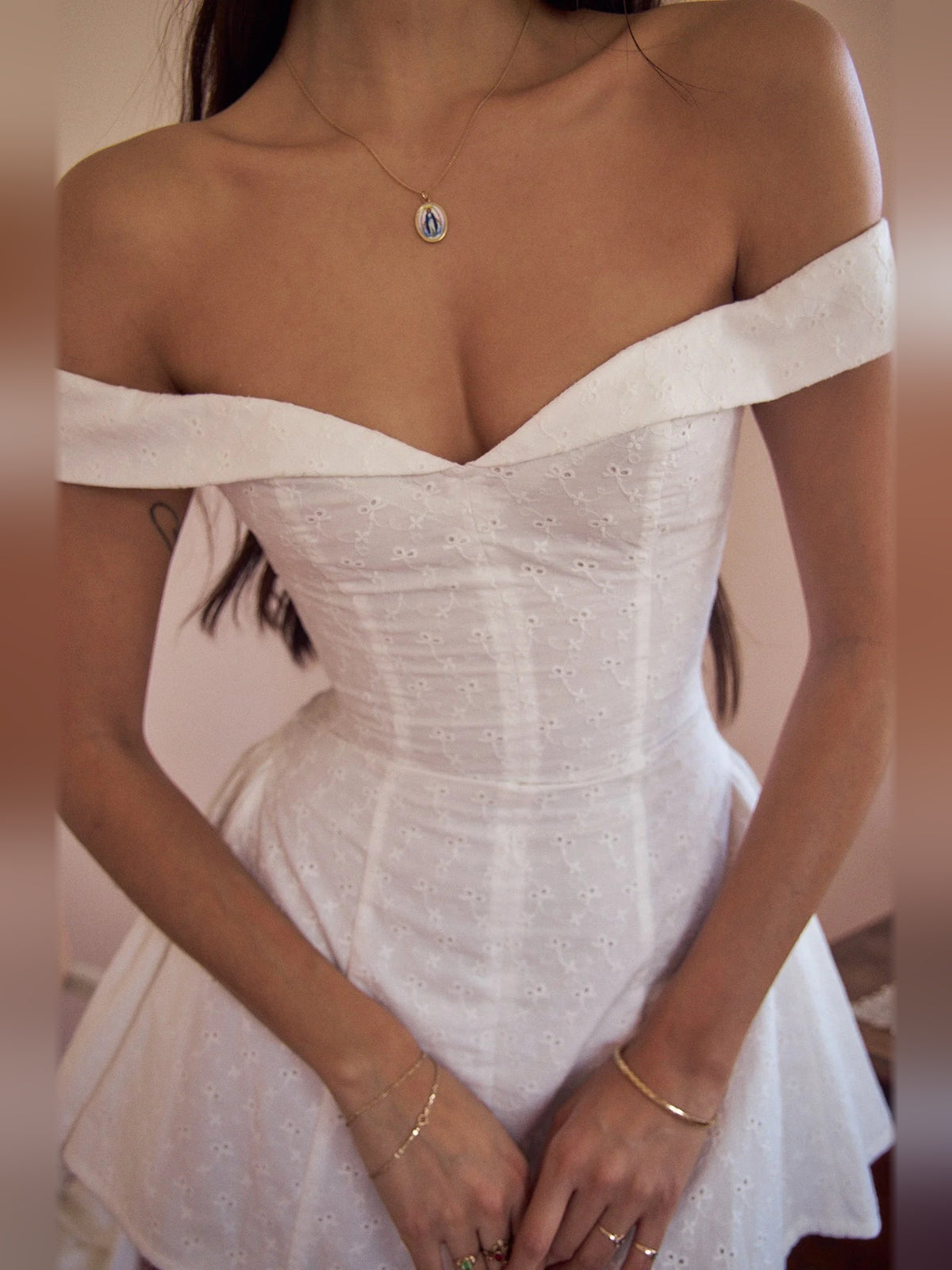 Ivory mini homecoming dress, alternate view showing the skirt and hem