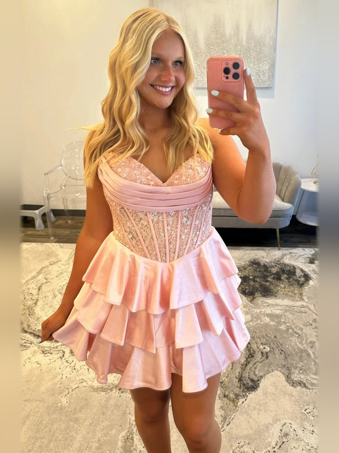 Light Pink mini homecoming dress, alternate view showing the skirt and hem