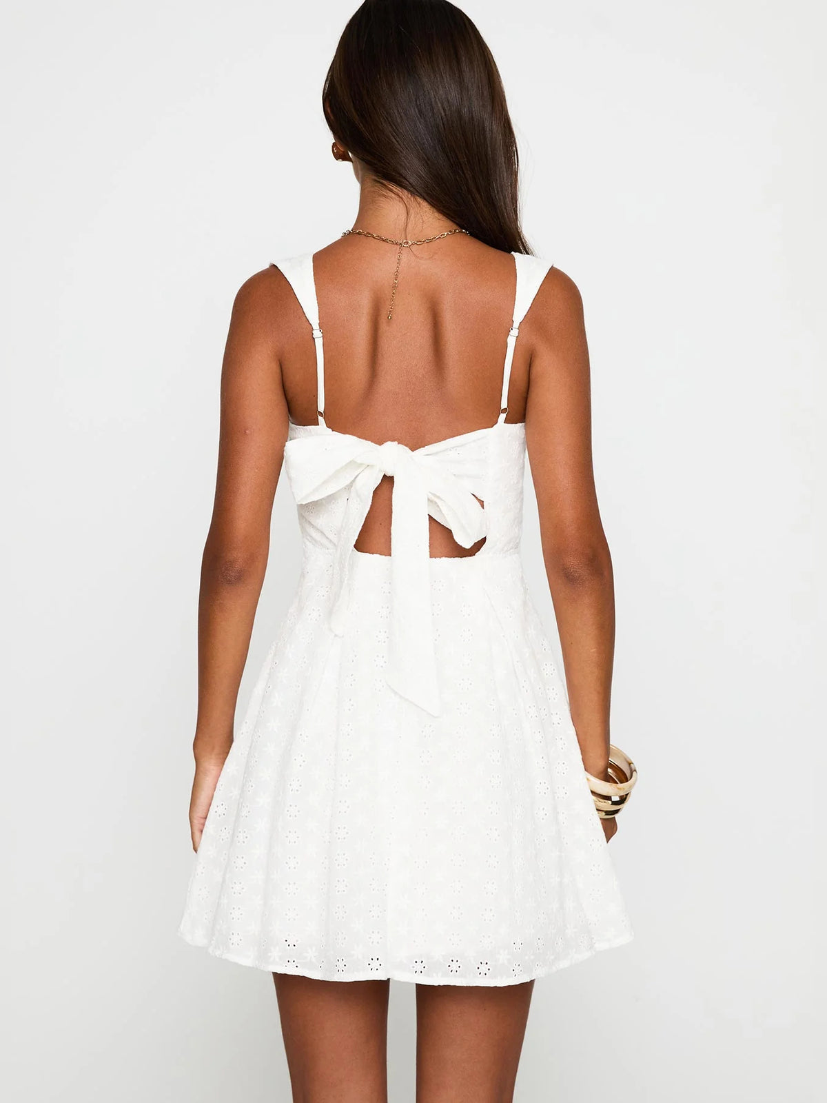 White mini homecoming dress, alternate view showing the skirt and hem