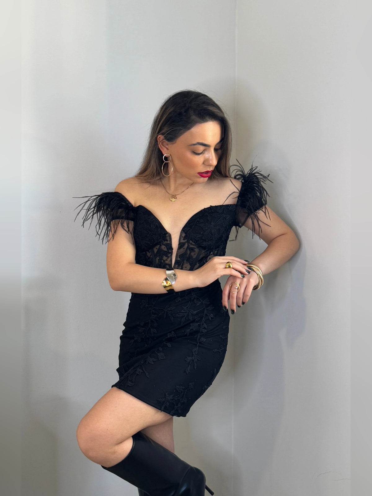 Black mini homecoming dress, alternate view showing the skirt and hem
