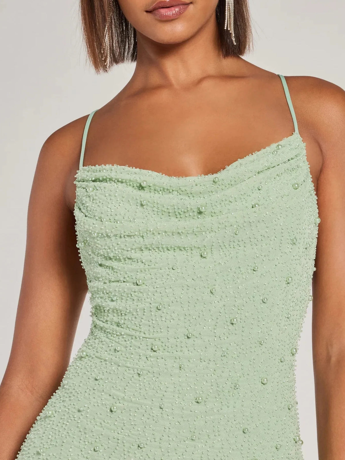 Mint Green mini homecoming dress, alternate view showing the skirt and hem