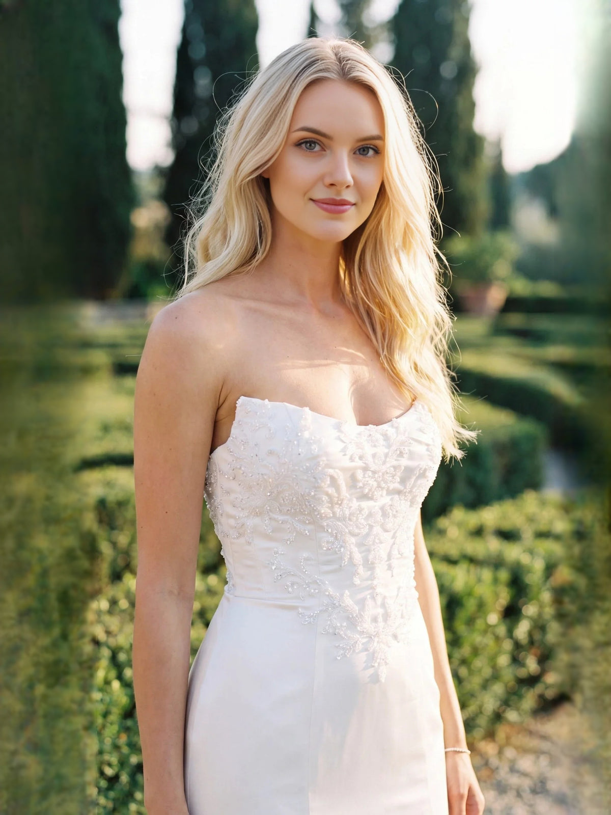 Ivory floor-length wedding dress, alternate view showing the skirt and hem