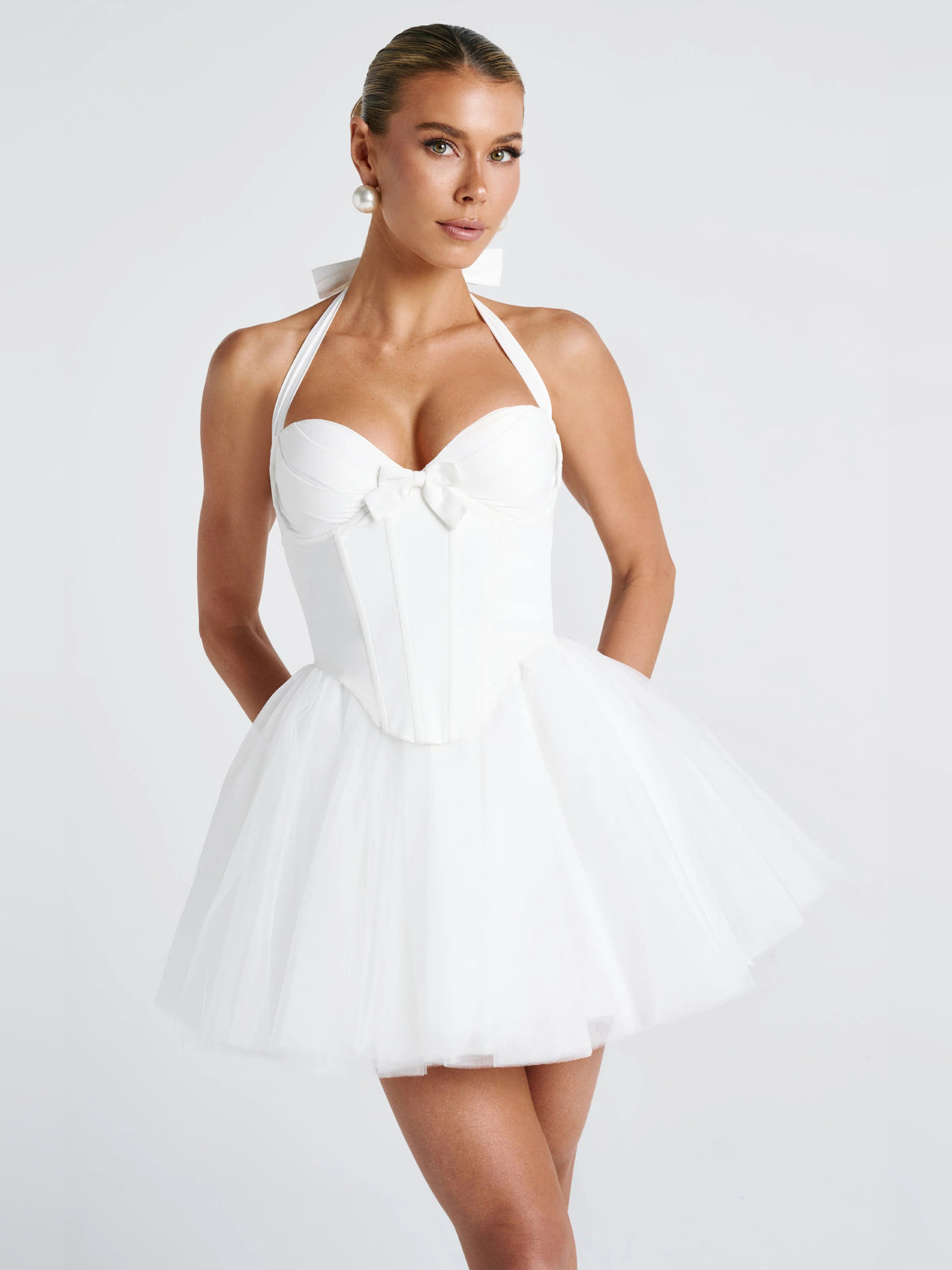 Ivory mini homecoming dress, alternate view showing the skirt and hem