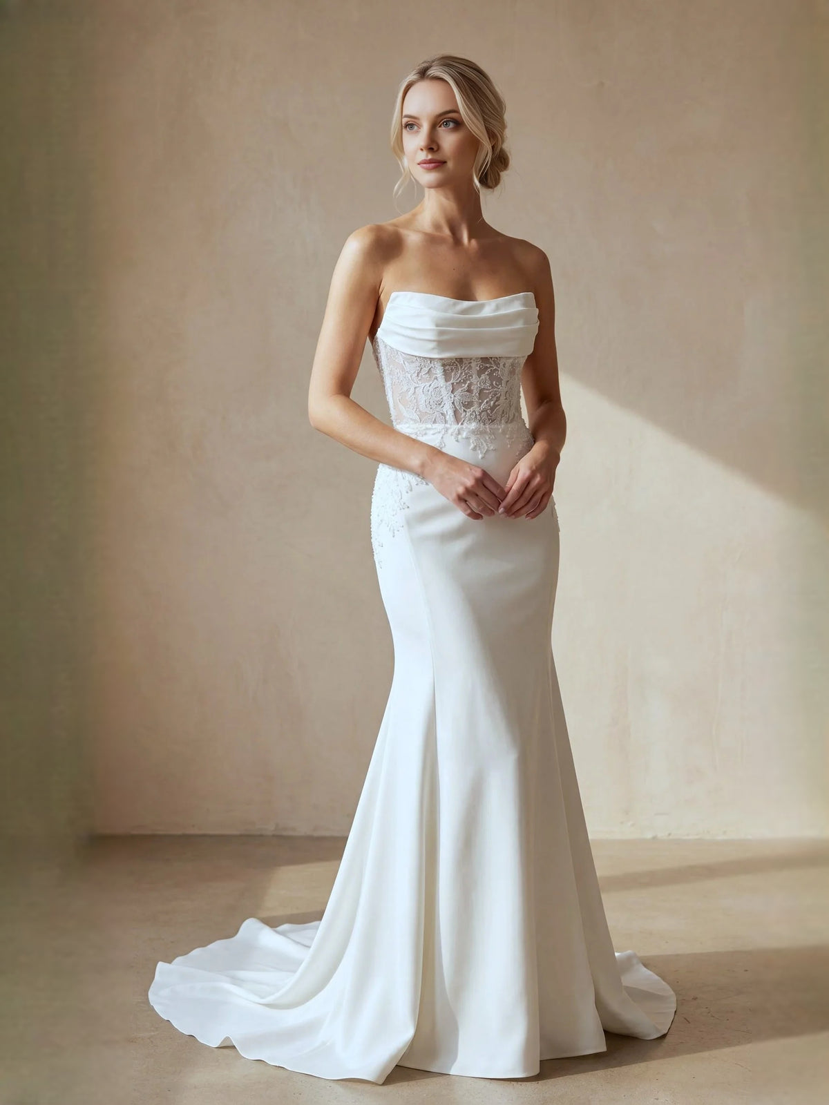 Ivory floor-length wedding dress, alternate view showing the skirt and hem