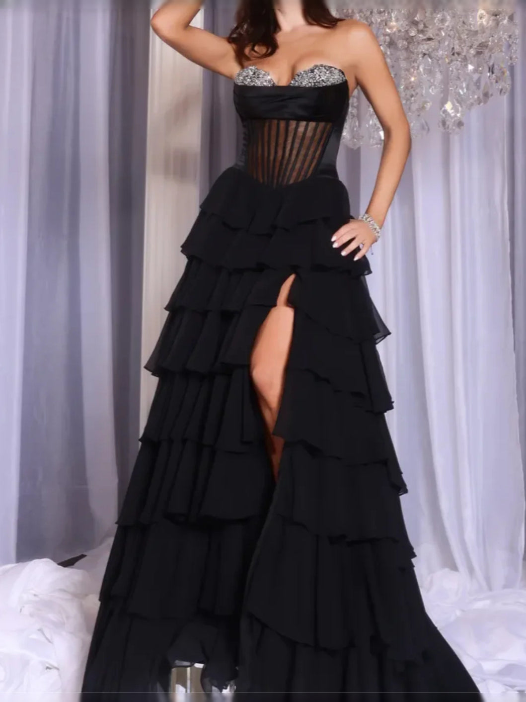 Black floor-length prom dress, alternate view showing the skirt and hem