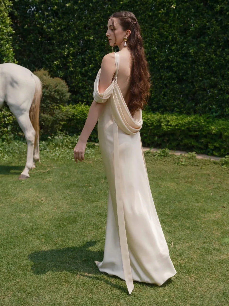 Ivory floor-length wedding dress, alternate view showing the skirt and hem