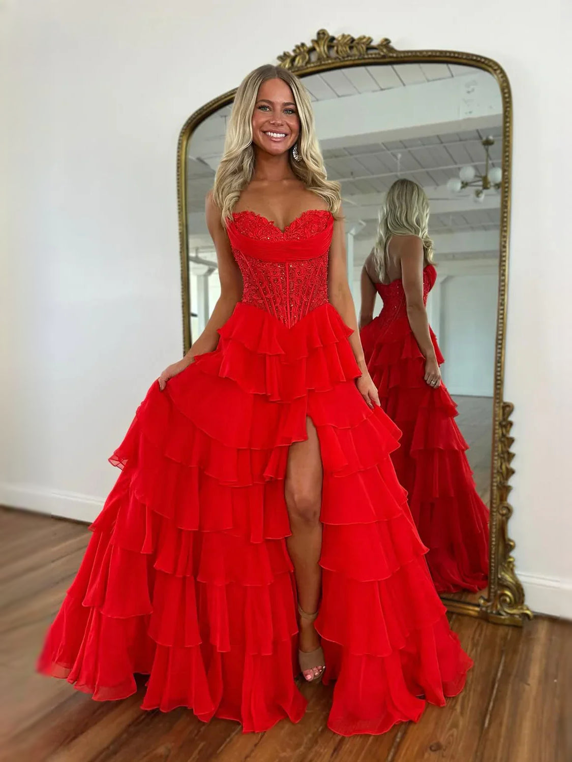 Red high-low prom dress, alternate view showing the skirt and hem