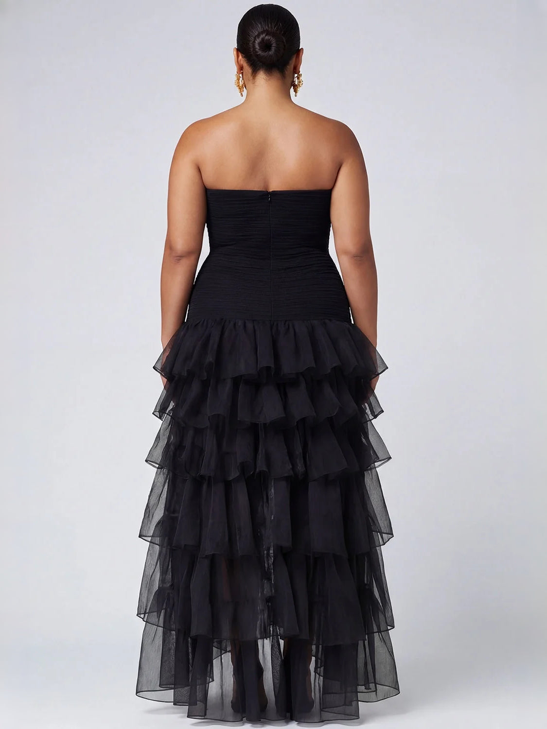 Black high-low prom dress, alternate view showing the skirt and hem