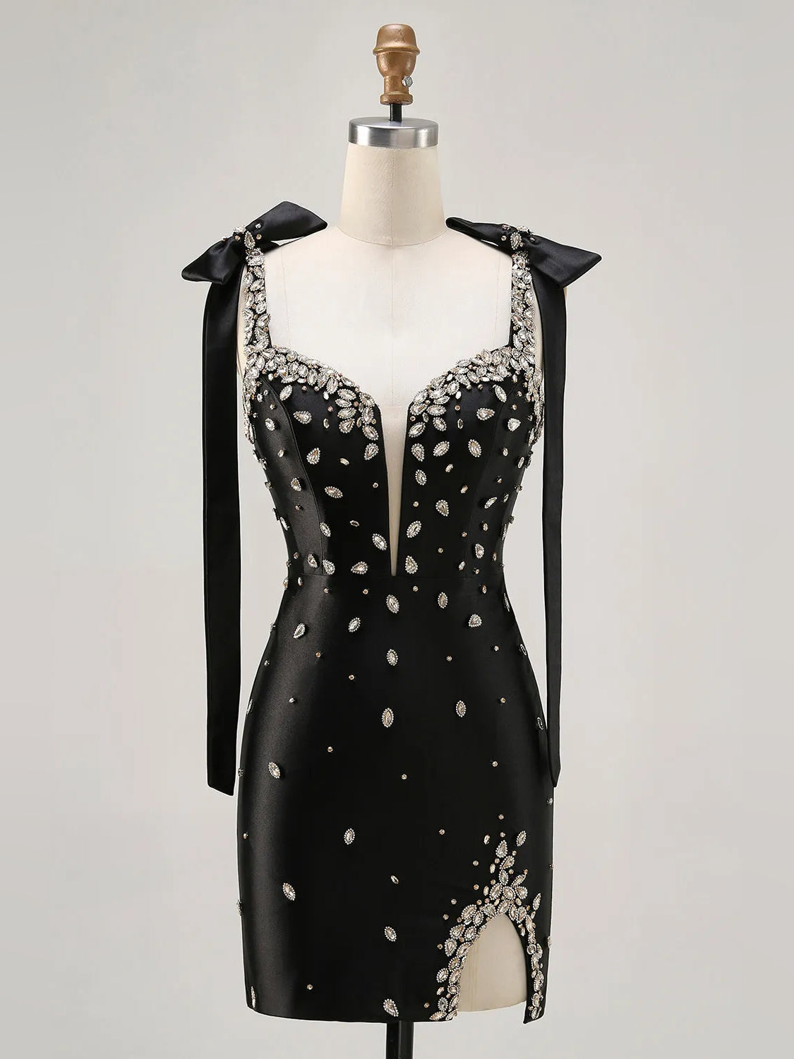 Black mini homecoming dress, alternate view showing the skirt and hem