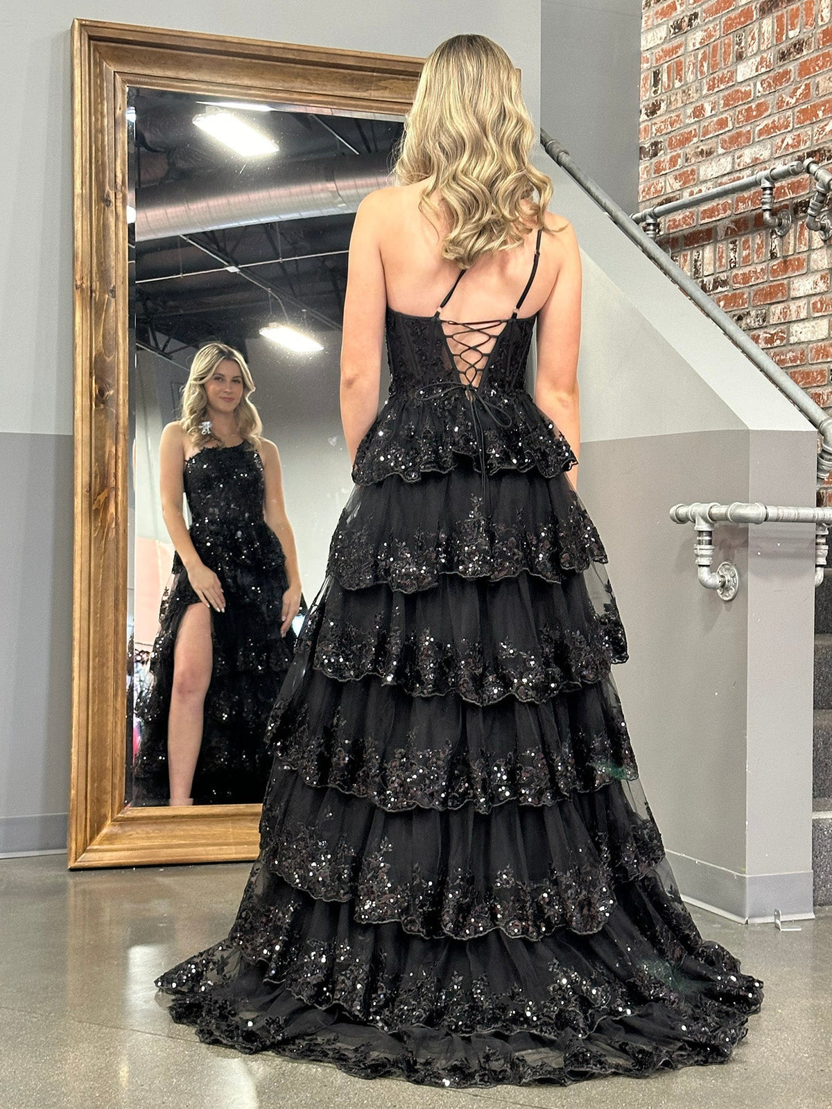 Black maxi prom dress, alternate view showing the skirt and hem