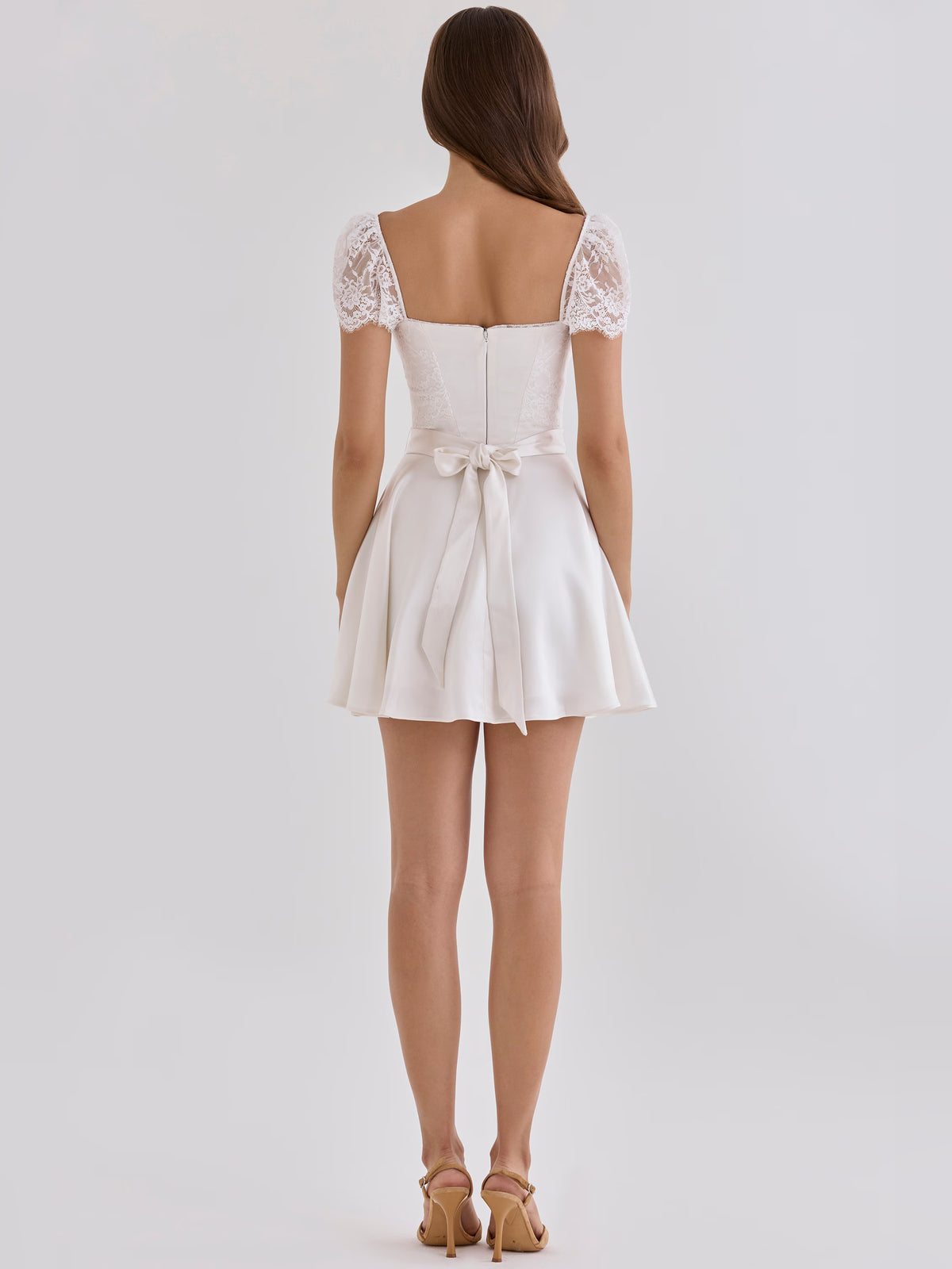 White mini homecoming dress, alternate view showing the skirt and hem