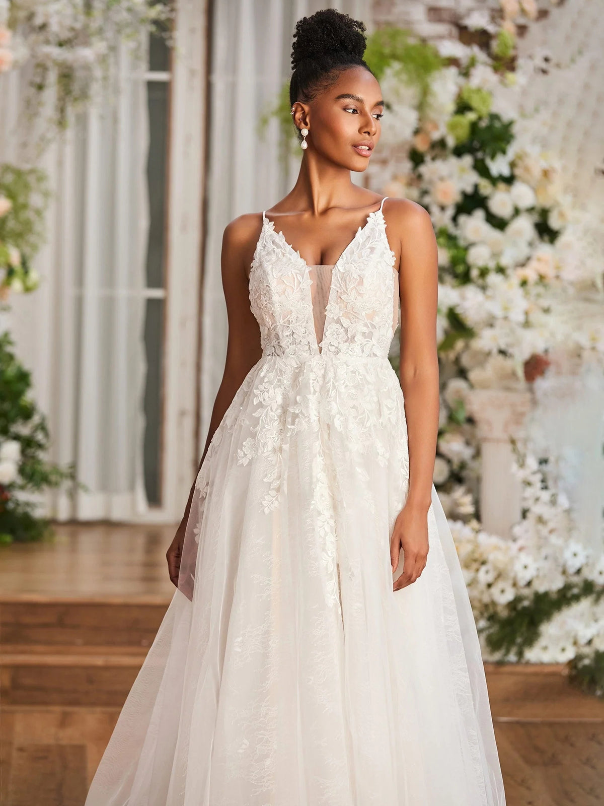 Ivory floor-length wedding dress, alternate view showing the skirt and hem