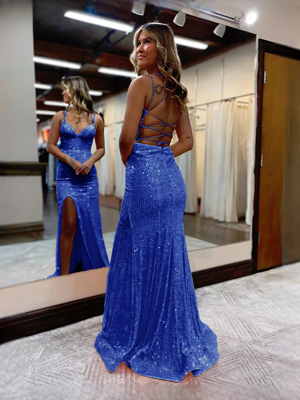 Orange floor-length prom dress, alternate view showing the skirt and hem