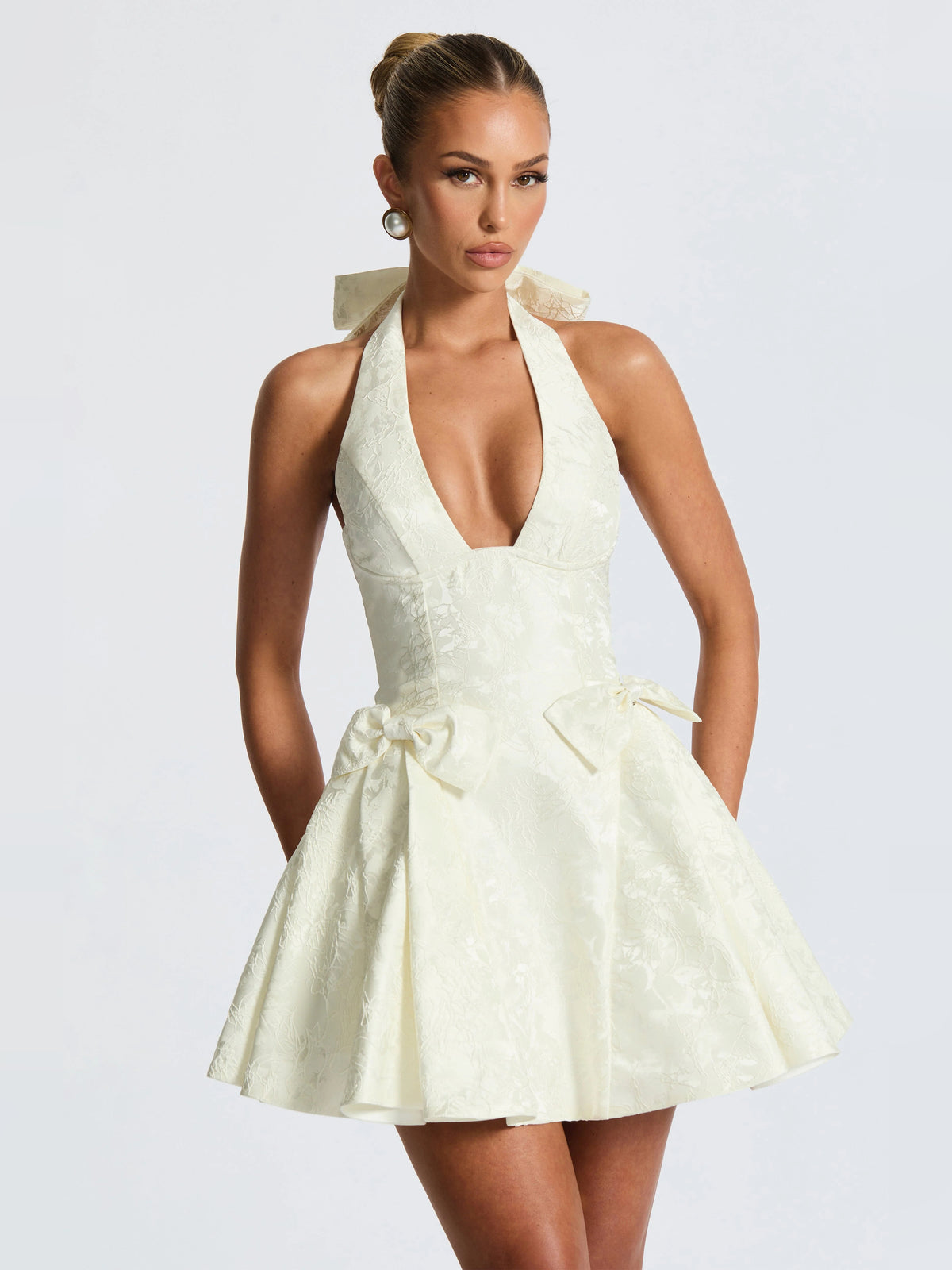 Ivory mini homecoming dress, alternate view showing the skirt and hem