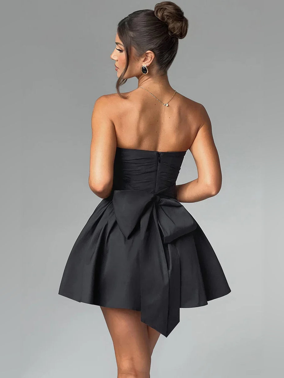 Black mini homecoming dress, alternate view showing the skirt and hem