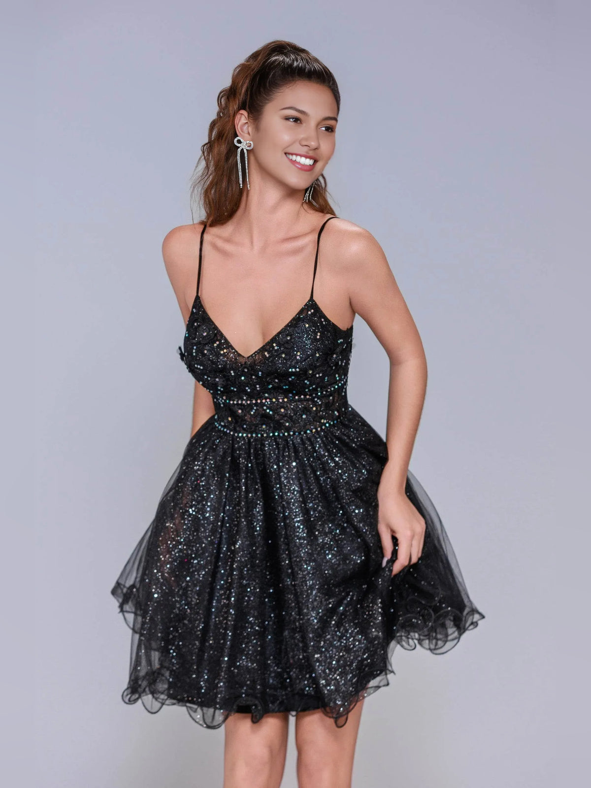 Black mini homecoming dress, alternate view showing the skirt and hem