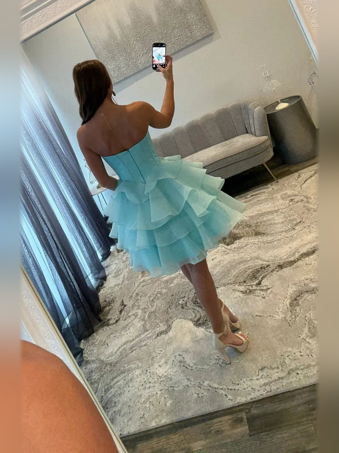 Ice Blue mini homecoming dress, alternate view showing the skirt and hem