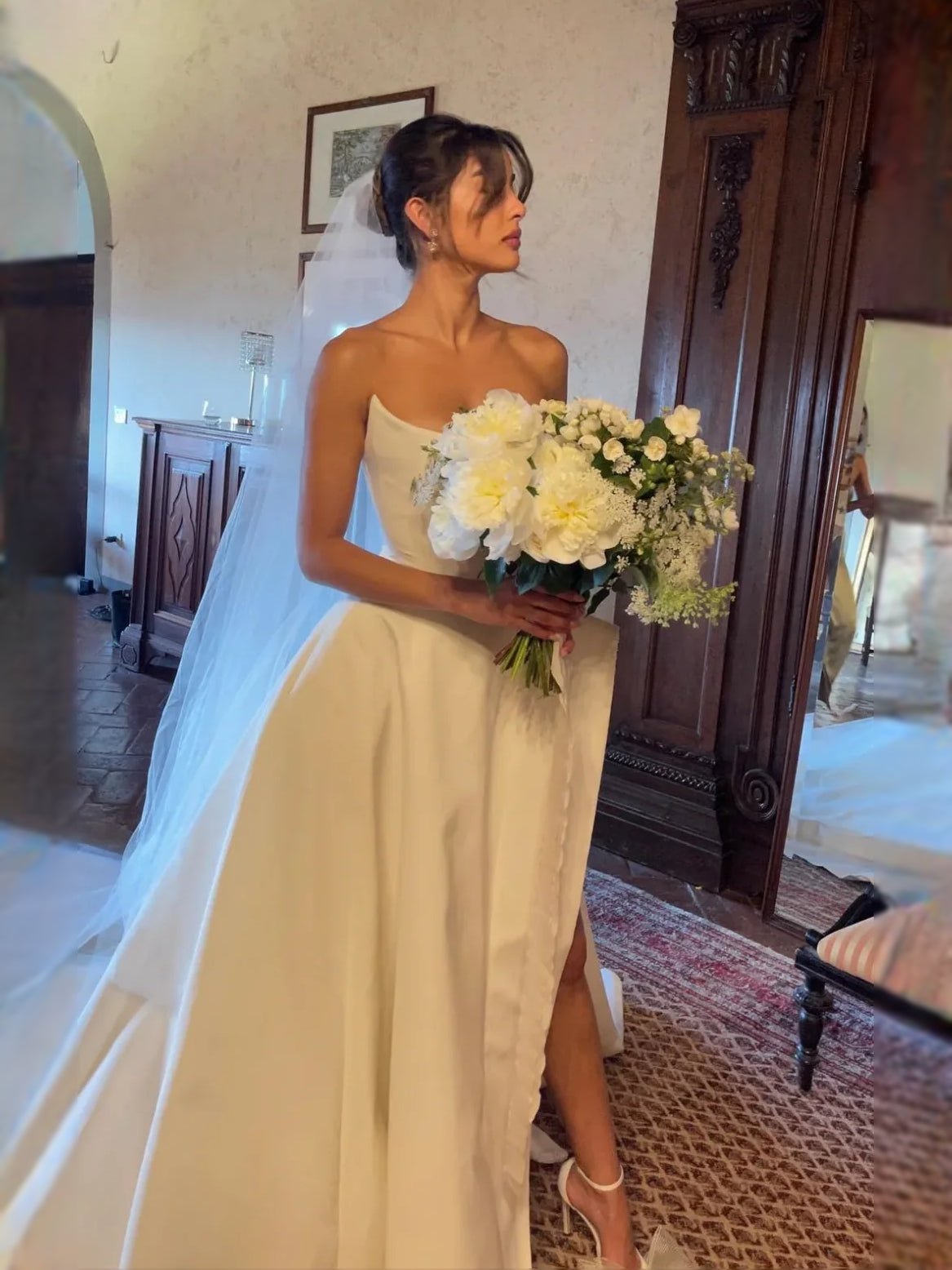 White floor-length wedding dress, alternate view showing the skirt and hem