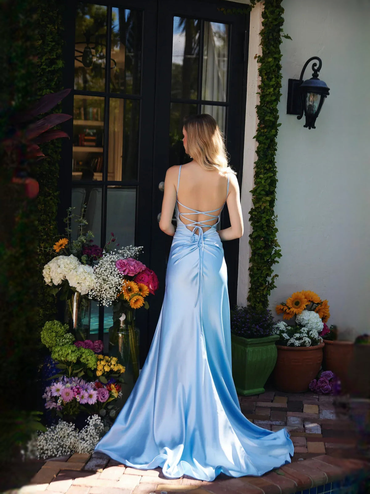 Orange maxi prom dress, alternate view showing the skirt and hem