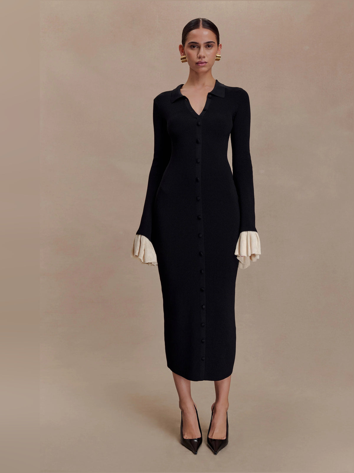 Black midi formal dress with ruffle details, alternate view showing the skirt