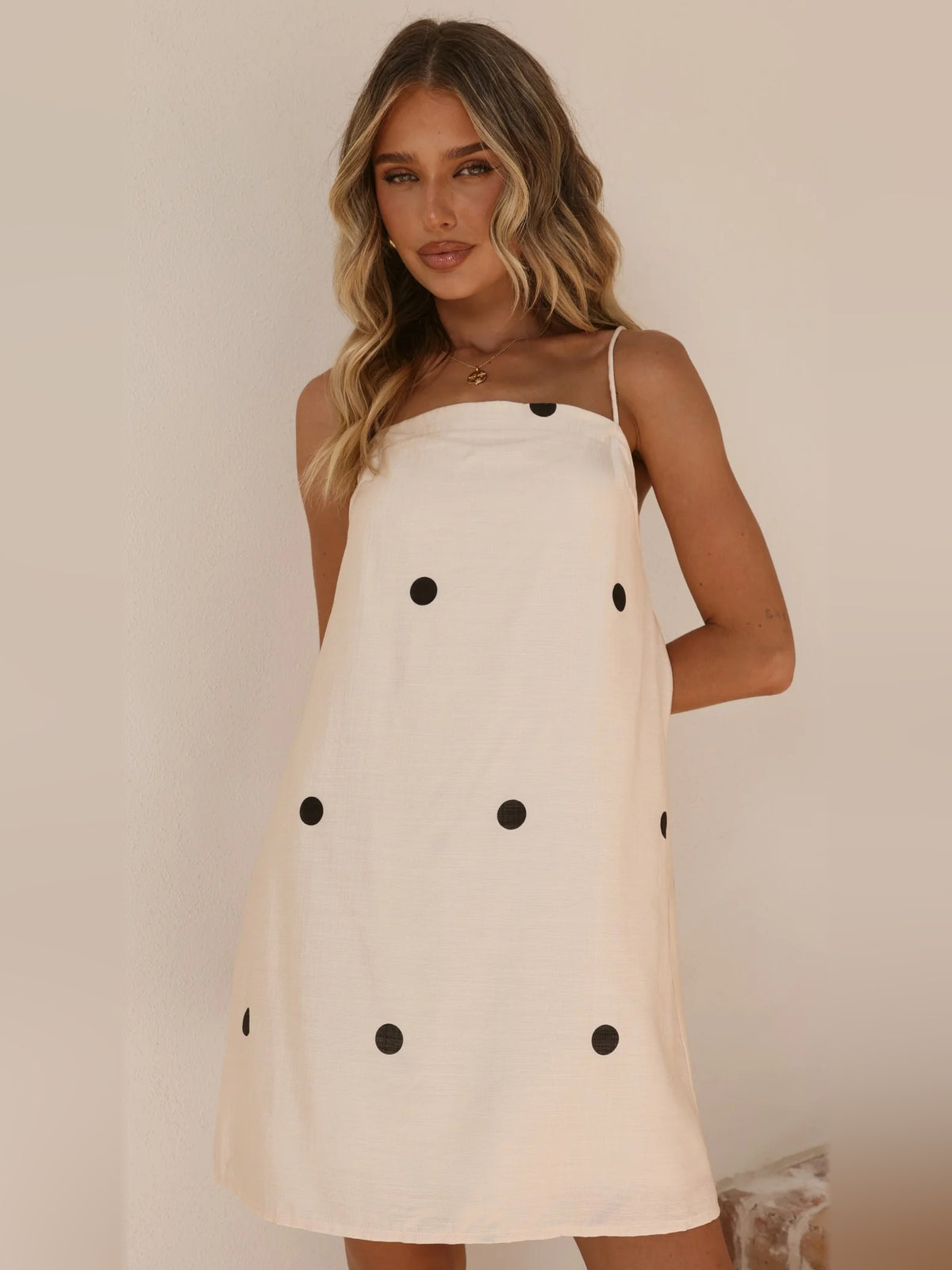 Cream mini homecoming dress, alternate view showing the full-length profile