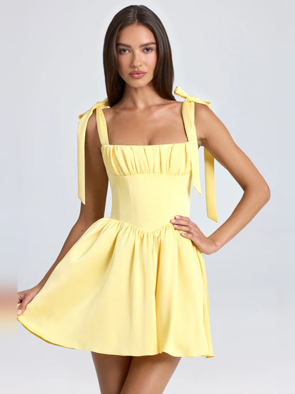 Yellow mini homecoming dress, alternate view showing the full-length profile