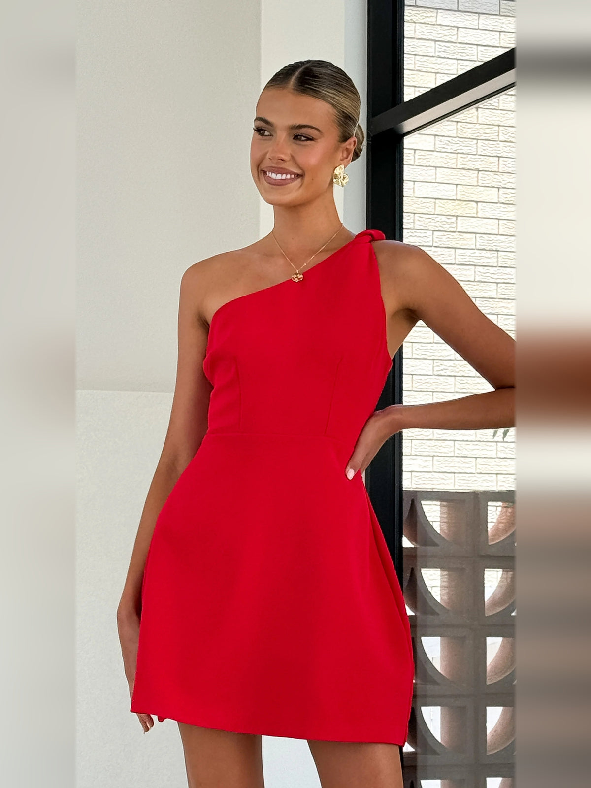 Red mini homecoming dress, alternate view showing the full-length profile