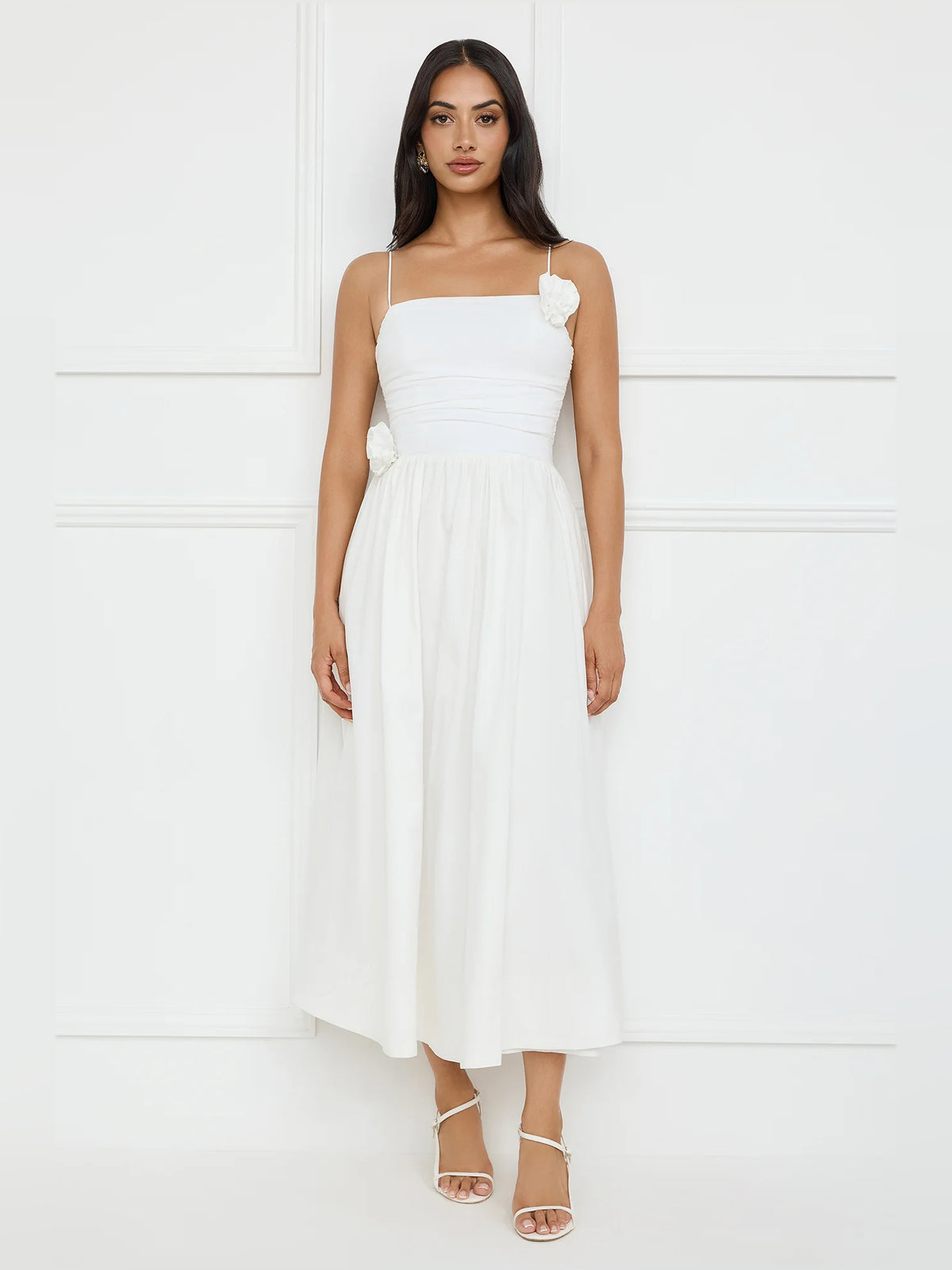White a-line maxi formal dress with floral appliqué, alternate view showing the hem