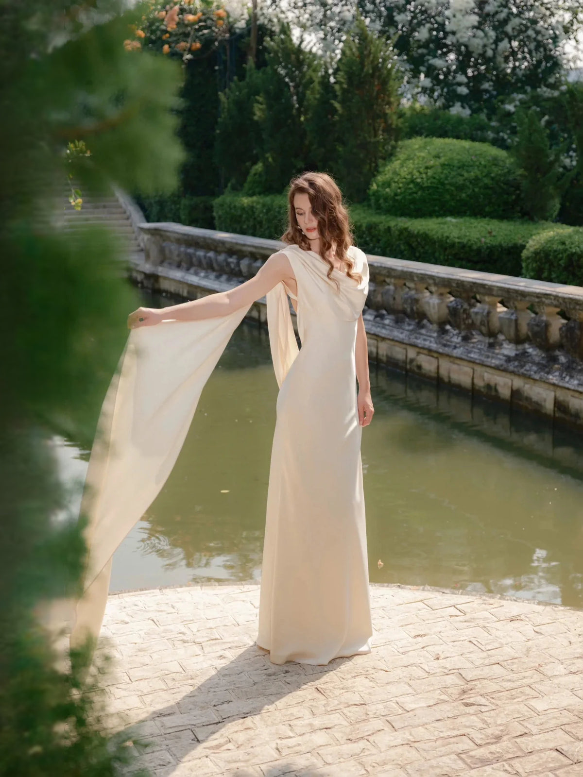Ivory floor-length wedding dress, alternate view showing the full-length profile