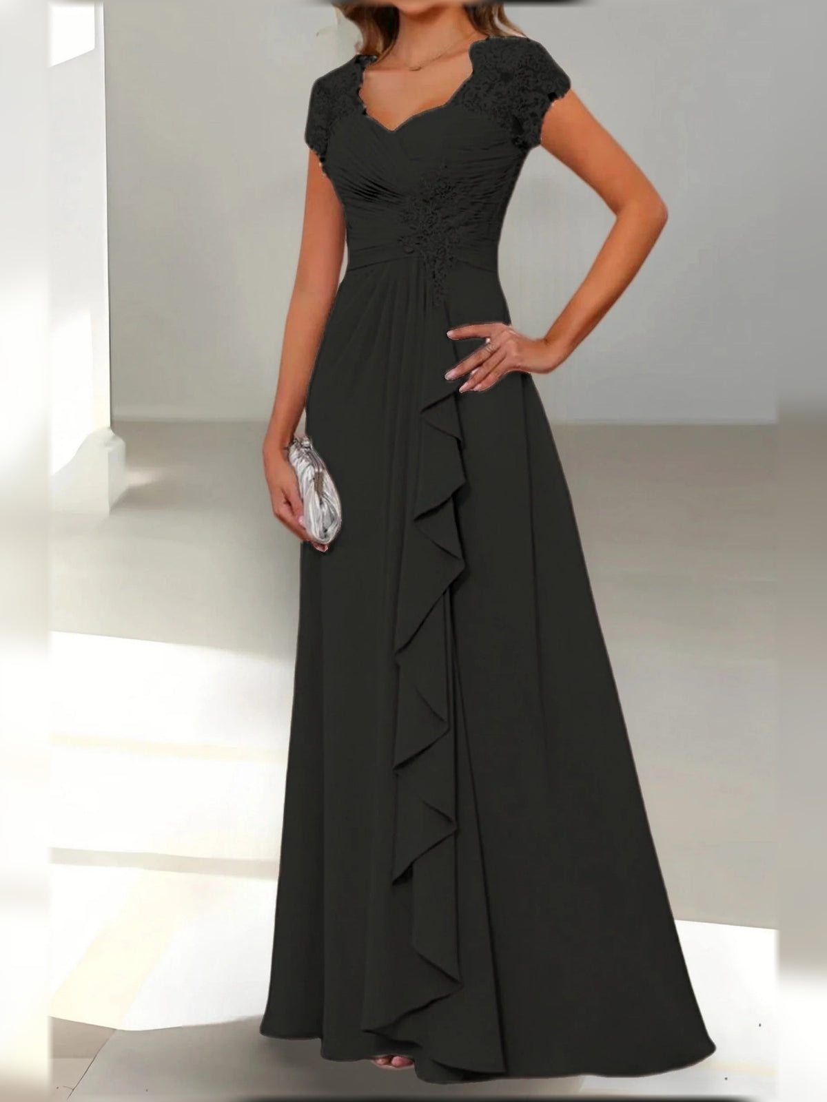 Black floor-length mother of the bride dress, alternate view showing the full-length profile