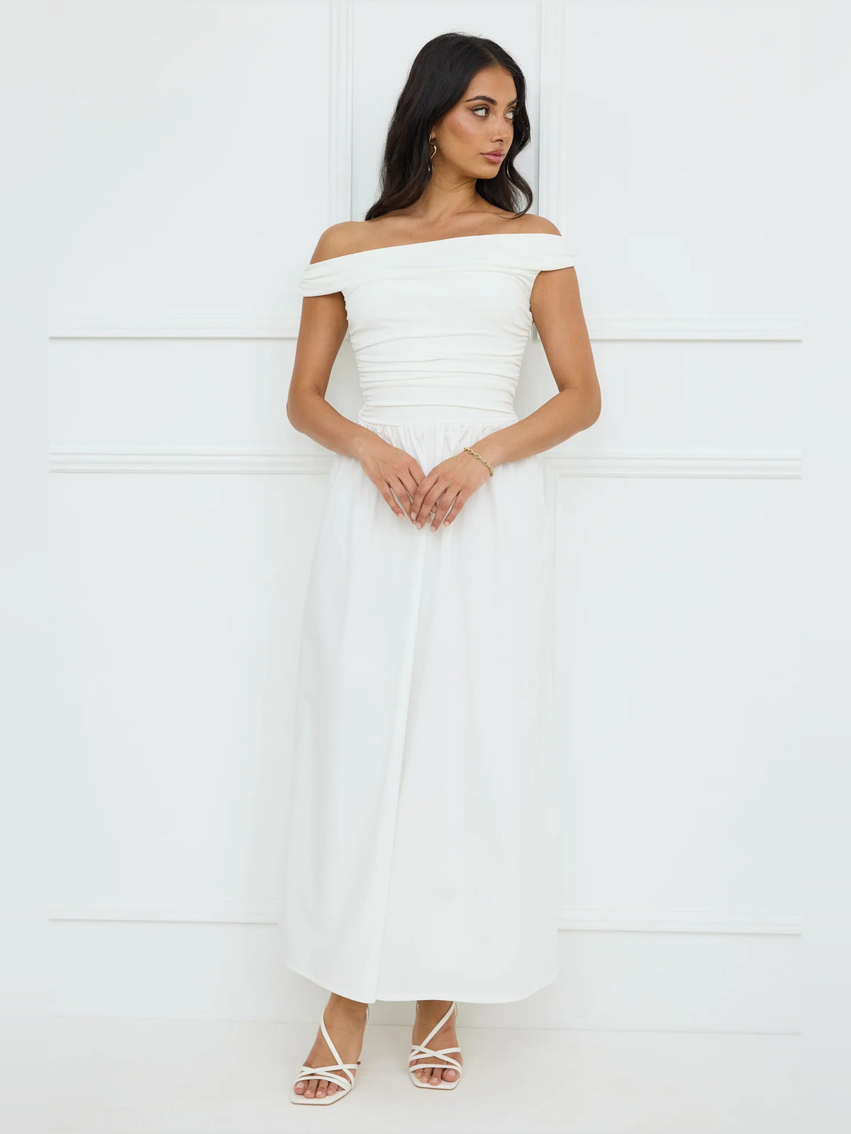 White a-line maxi formal dress with off-the-shoulder neckline, alternate view showing the hem
