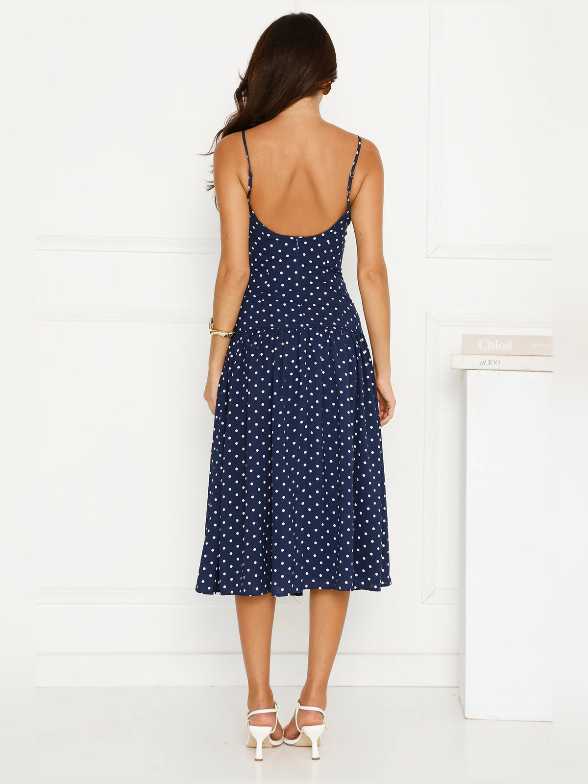 Navy midi formal dress with printed pattern, alternate view showing the hem