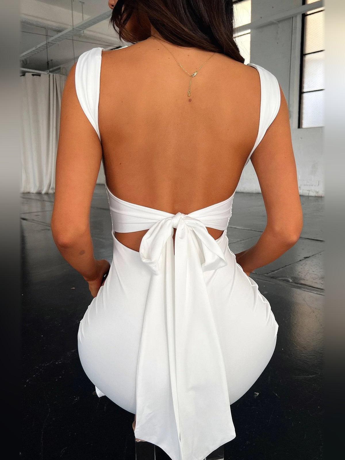 Ivory white mini homecoming dress, alternate view showing the full-length profile