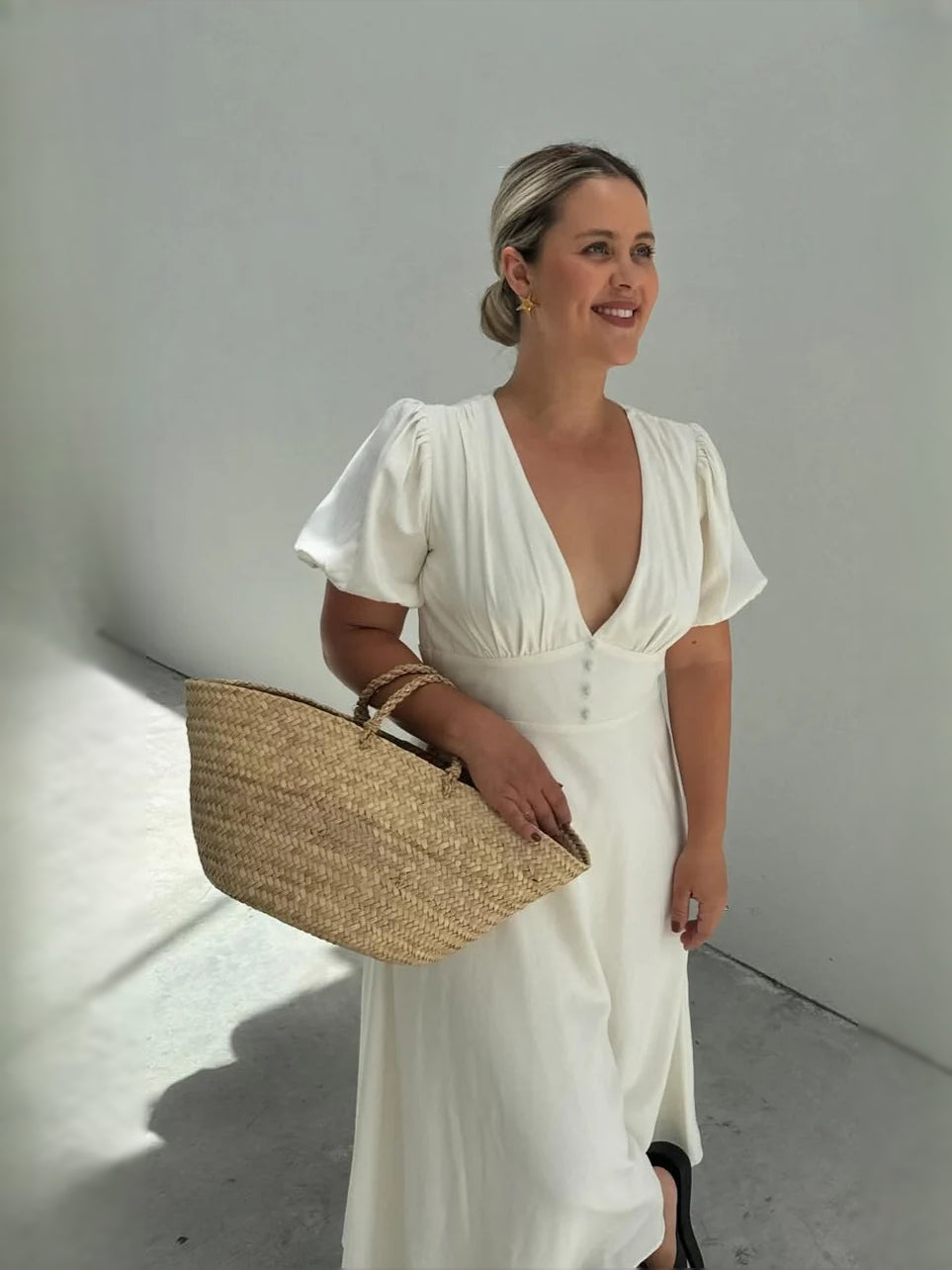 White midi formal dress, alternate view showing the hem