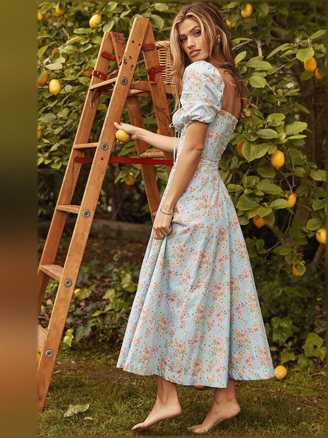 Floral midi formal dress with floral print, alternate view showing the hem