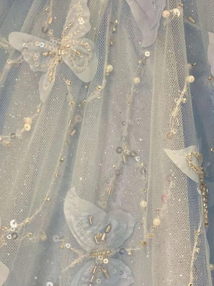 Sky Blue maxi prom dress, back view showing the rear of the dress showing the garment from a different position