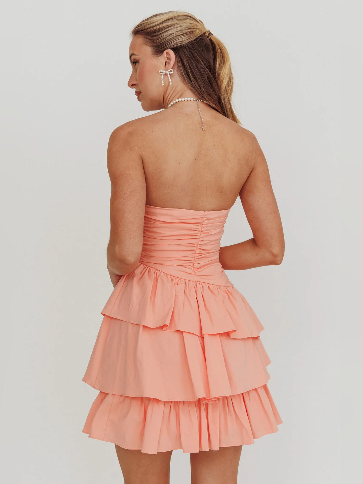 Ivory mini homecoming dress, alternate view showing the full-length profile