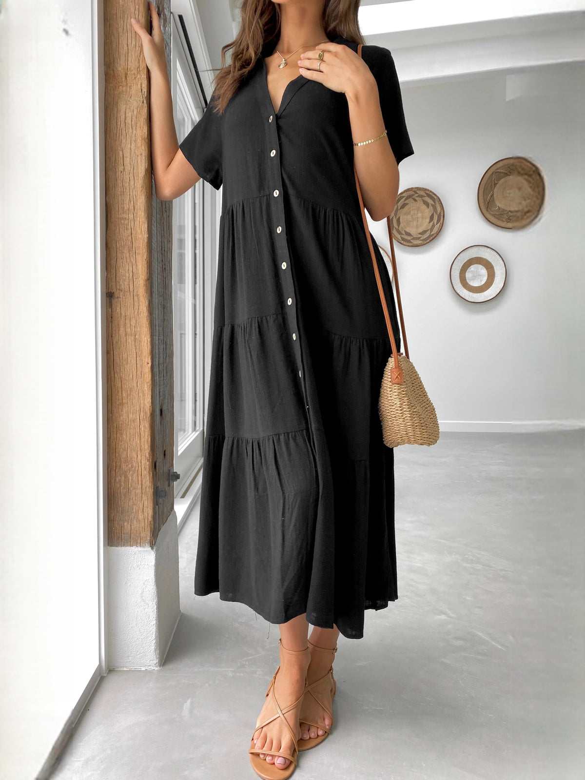 Black midi formal dress, alternate view showing the hem